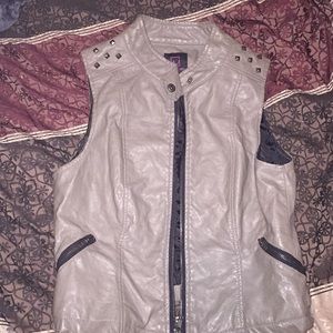 Leather vest with little studs on the shoulders
